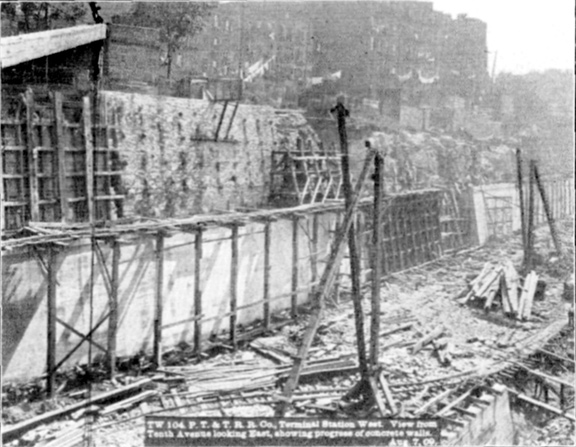 Plate L, Fig. 4.— TW 104, P.N.Y. & L.I.R.R. Terminal Station West. View from Tenth Avenue looking East, showing progress of concrete walls. Aug. 7, 09.